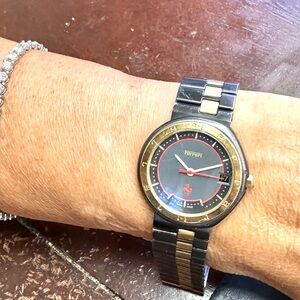 Vintage 80’s Ferrari Elegant Black and Gold Watch
